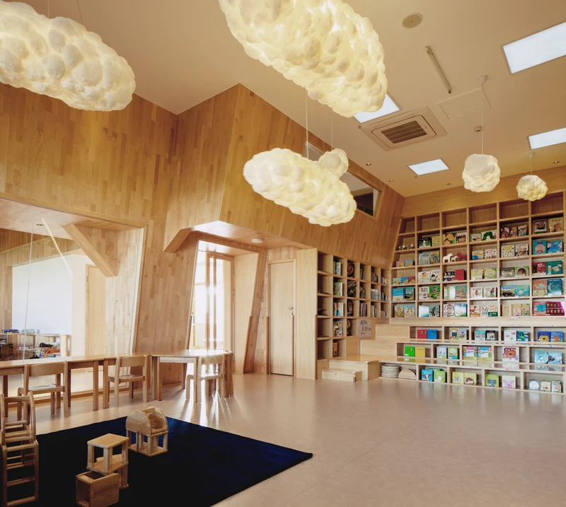 Apart from including a number of dedicated learning spaces such as a library, a music room and an interactive projection room, VMDPE Design's IBOBI Kindergarten also provides outdoor play space. Photography: Kevin Ho, VMDPE Design