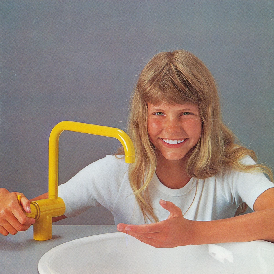 Top: Vola founder Verner Overgaard with the KV1, a fitting that has turned into a design classic. Above: A historical advertising photo from the 1970s, when Vola introduced colours in line with the spirit of the times  