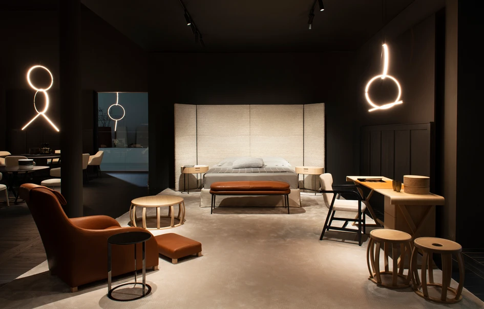 Top: The new sofa family “Apollo” designed by Antonio Citterio, the creative head behind Maxalto. Middle: The new "Tesaurus" storage unit is available in various sizes and wood finishes. Above: The bed "Dike" with its striking headboard