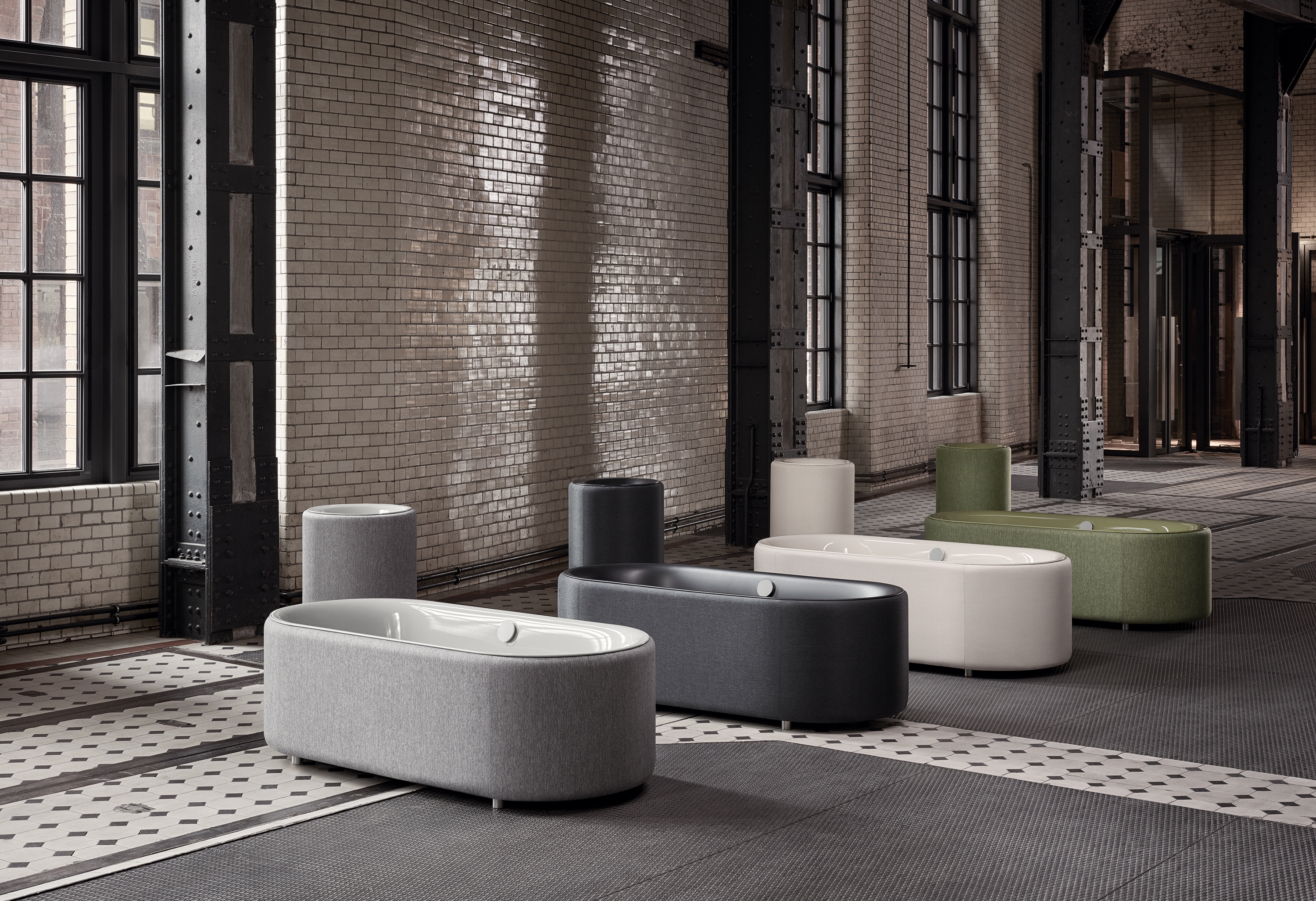 Letting each other in: The BetteLoft built-in washbasin combines minimalist design with an expressive character (top). The BetteLux Oval Couture bathtub meanwhile demonstrates sensitivity with its water-resistant fabric (above)