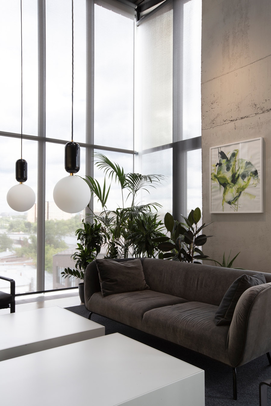Muted tones and pared-back custom furniture, designed by Alexander Volkov Architects, create a beguiling space for NV/9 ARTKVARTAL Sales Office. Photographer: Ilya Ivanov 