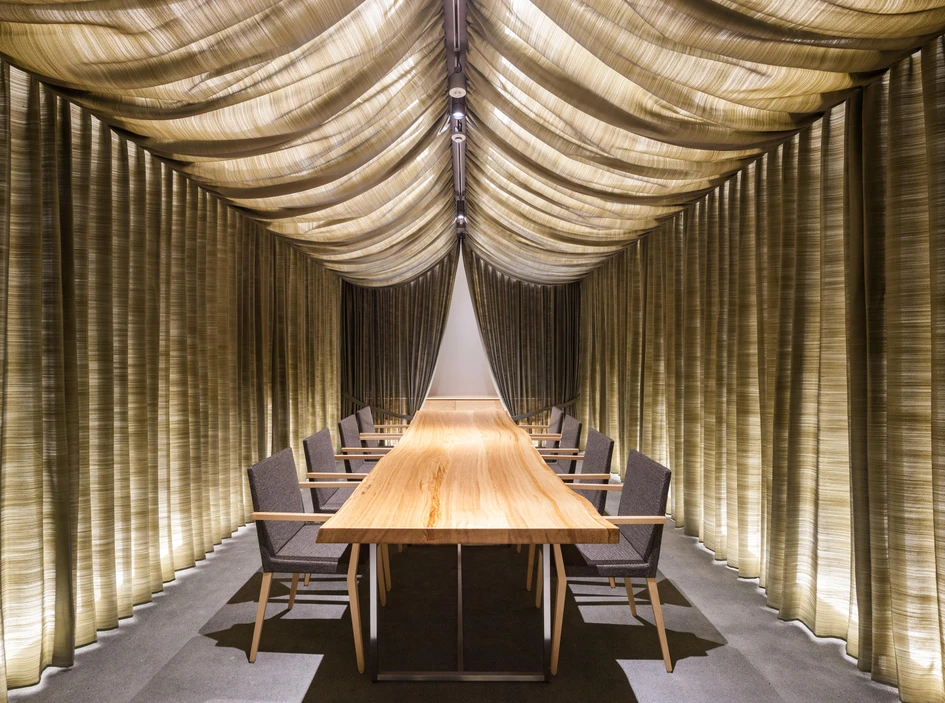 Kengo Kuma & Associates have used pleated cloth to create a rustic, cave-like vaulted restaurant overlooking a nearby volcanic lake. Photos: © Kawasumi Kobayashi Kenji Photograph Office