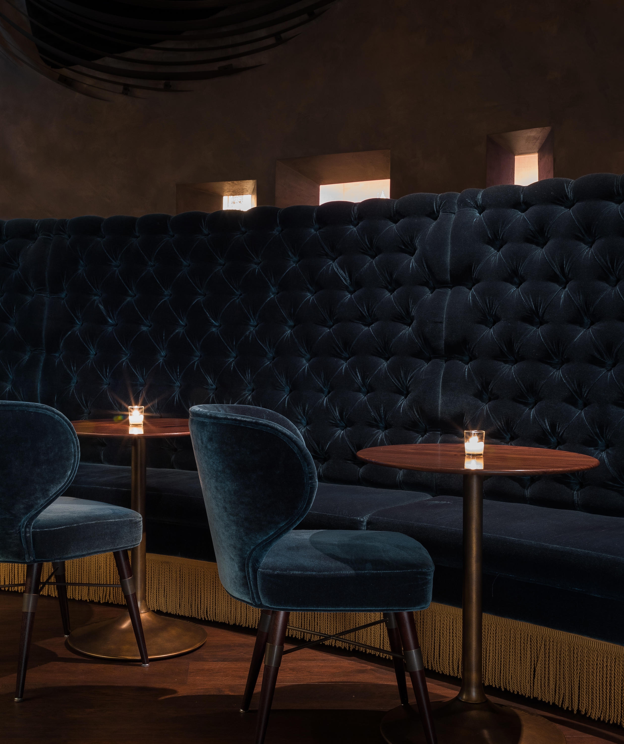 Graham Baba Architects combine opulent furnishings and finishes and create an eccentric ambience with cabinet curiosities in Seattle's Deep Dive bar. Photos: Haris Kenjar