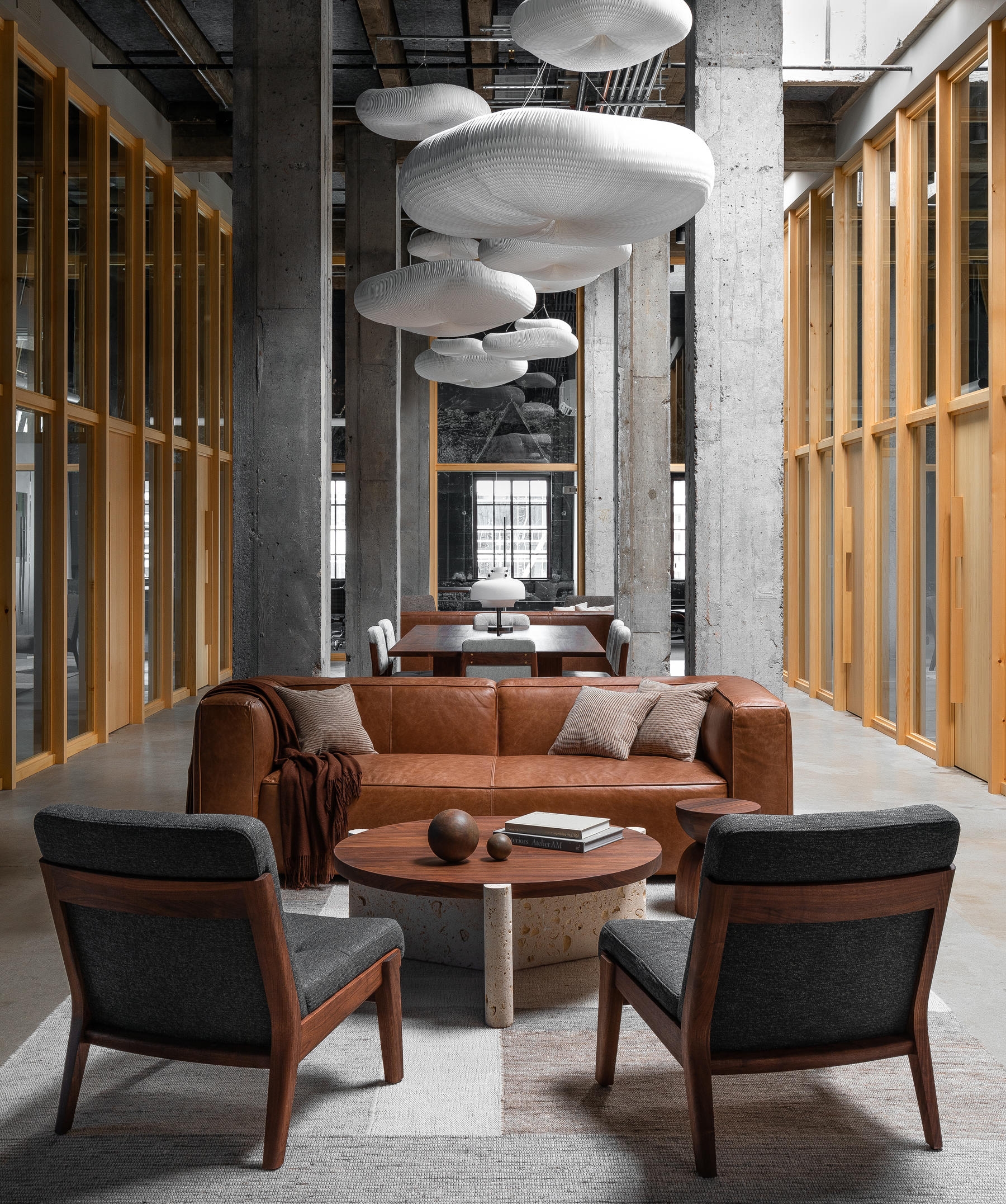 On their Studio Penthouse project in Portland, JHL Design reserved the central space – where the roof is at its highest – for a communal zone full of comfortable lounge chairs and sofas. Photo: Haris Kenjar