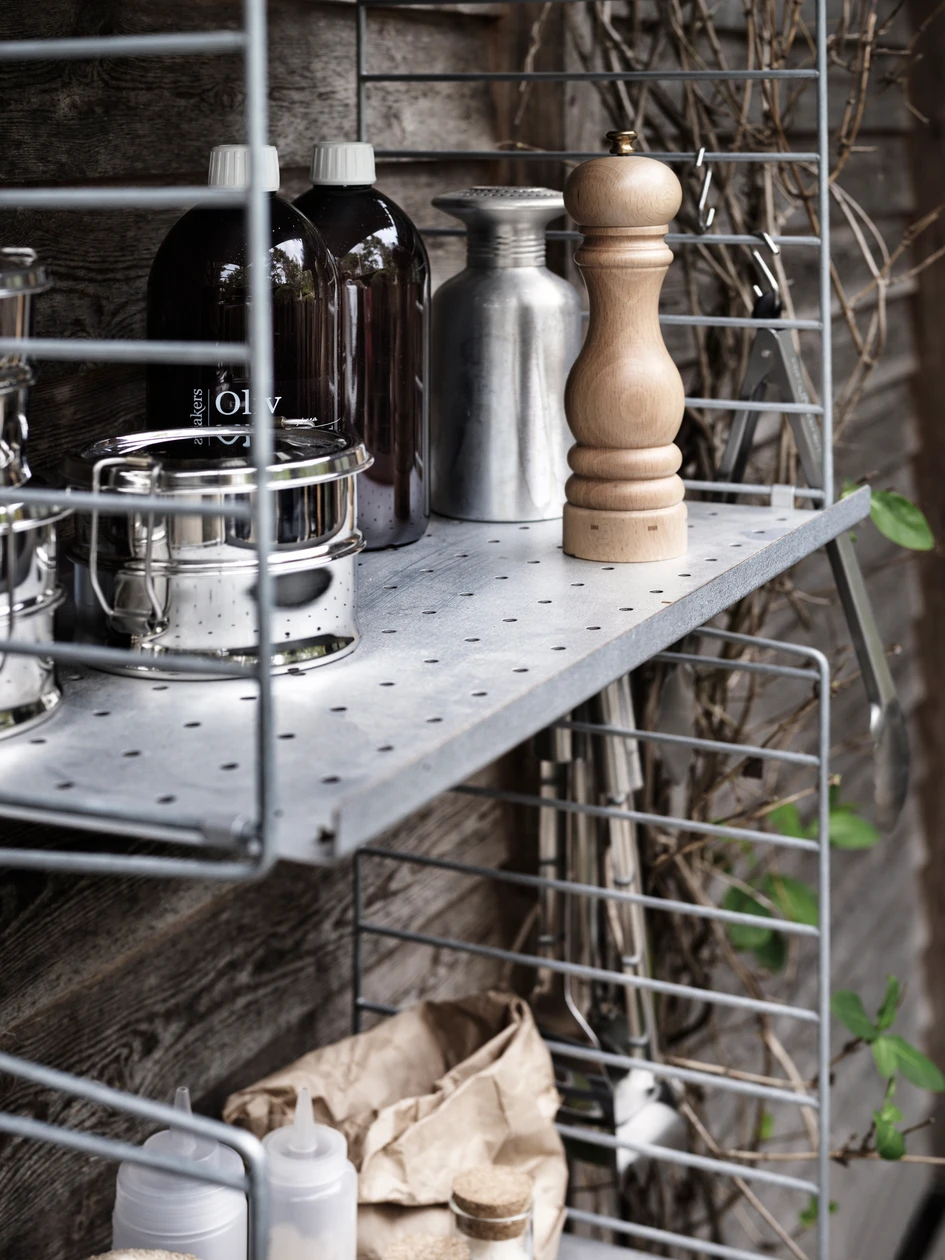 With side panels dipped in a molten zinc bath to prevent corrosion and galvanised, 'self-healing' shelving, String Furniture's new outdoor products are companions for all seasons