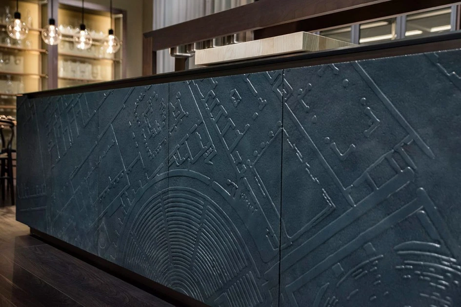 Practical compartments for utensils and doors that open at 180° underline Canossa’s flexibility and functionality. Another kitchen, Pompei, marries style and substance: the design, which references the ancient buried city, is aptly fronted by lava stone 