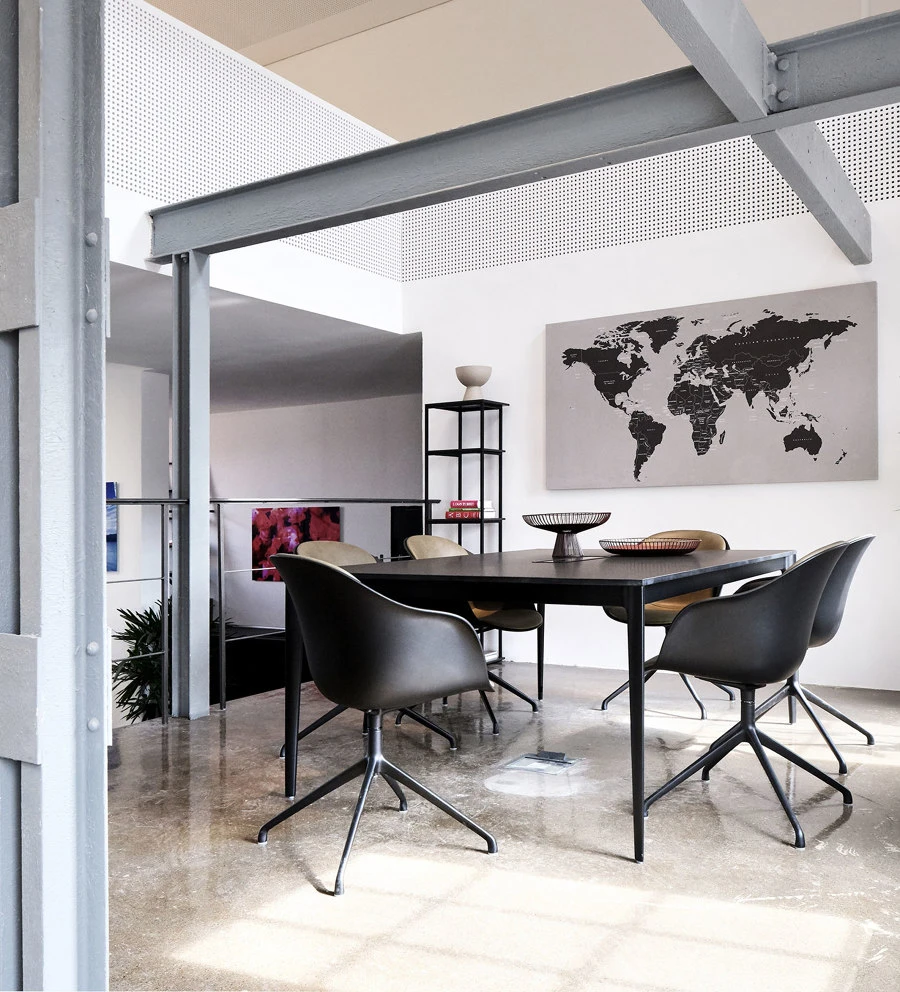 A meeting room at Kern Innovations is furnished with classic, curvaceous, comfortable Adelaide chairs