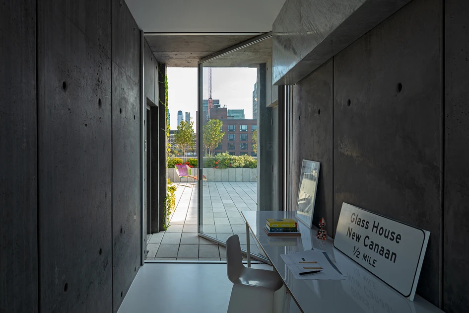 The Pivot door forms a minimal threshold between inside and outside, pivoting around an asymmetric axis to create a temporary spatial structure