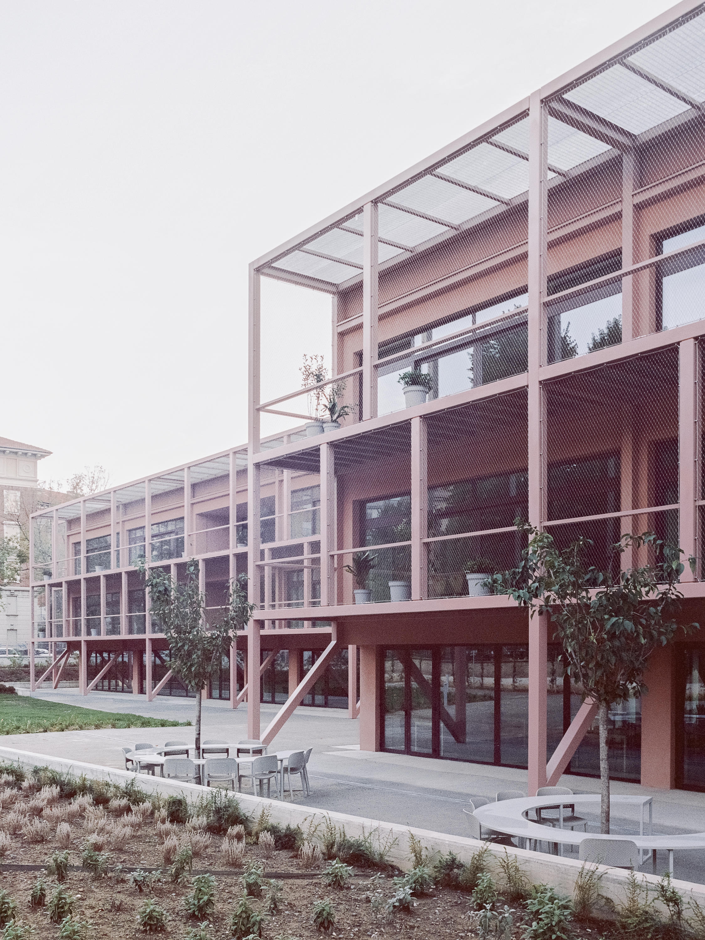 The Enrico Fermi School by Turin’s BDR Bureau: ‘New spatial elements, transparencies and additions reinterpret the original structure with the aim of opening the school to the city’. Photo: © Simone Bossi