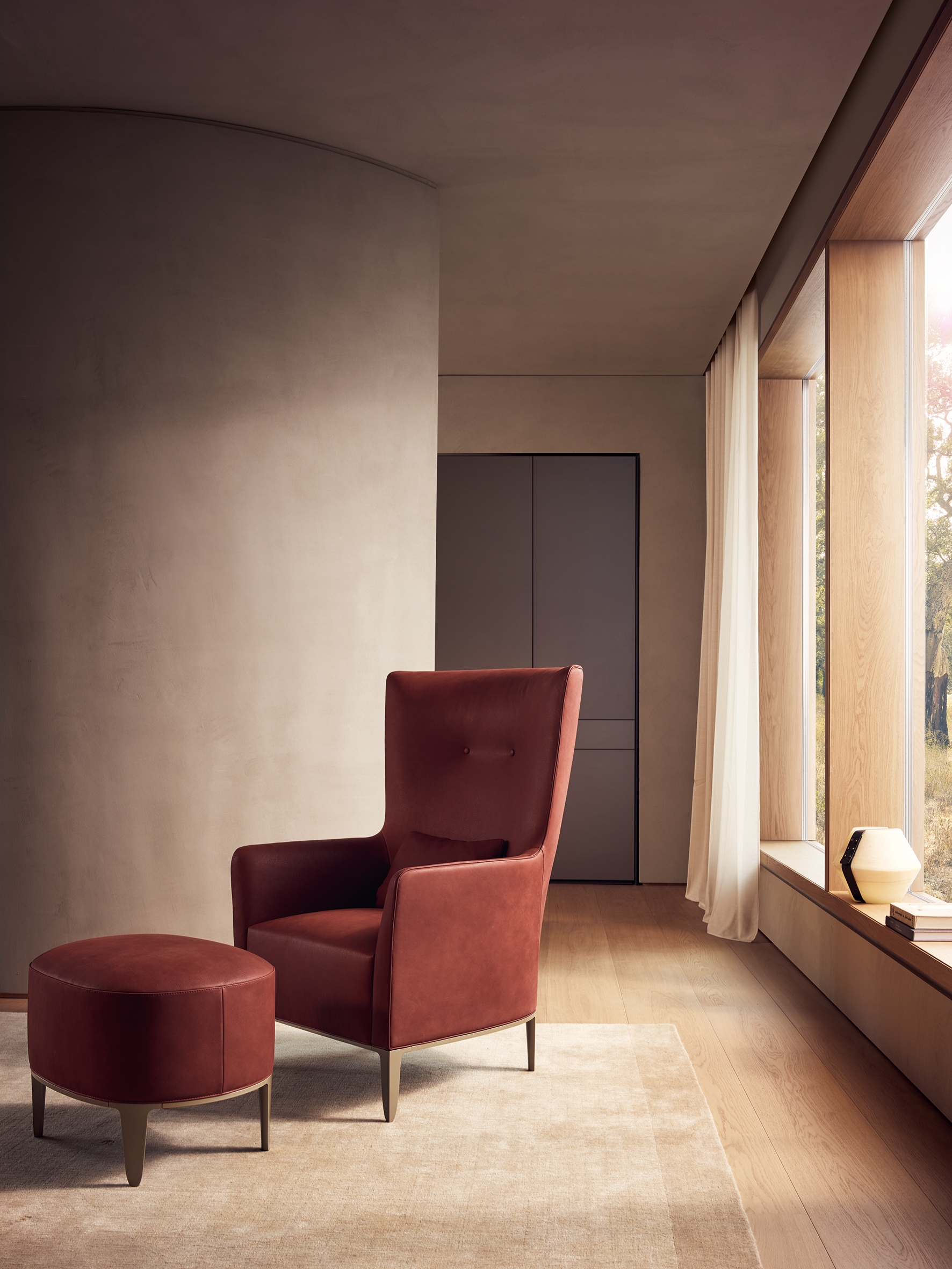 Top, middle: the perfectly reduced Kay Lounge in leather and steel; Above: Gentleman armchair and pouf 