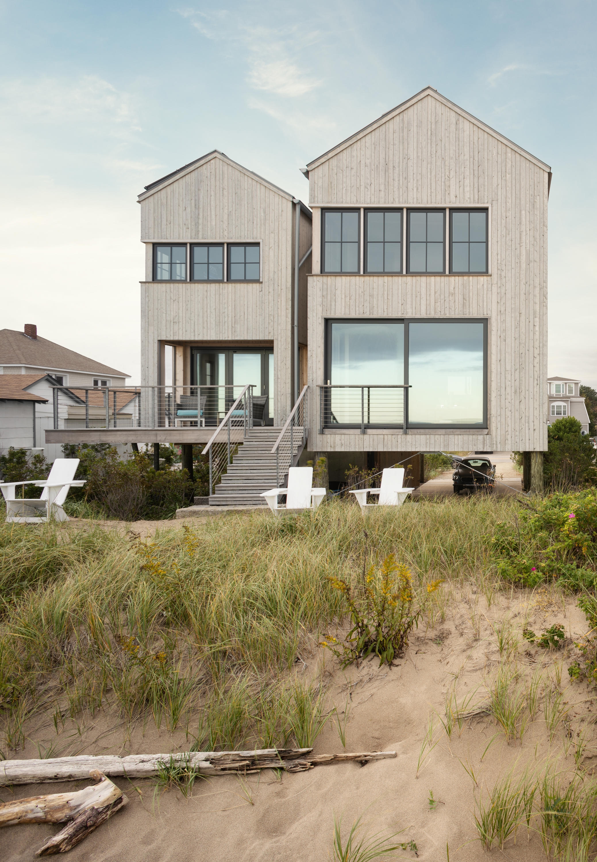Caleb Johnson Studio’s ‘In The Dunes’ project in Maine consists of two, timber-clad conjoined volumes which serve to break up its visual bulk. Photo: Trent Bell Photography