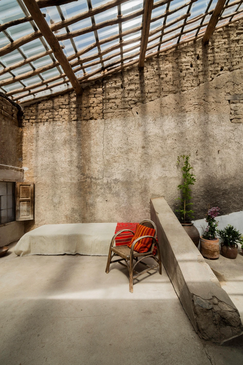 The exposed weathered walls of G+F Arquitectos’ barn conversion project in rural Spain showcase the building's vernacular architecture. Photo: Joaquín Mosquera Casares