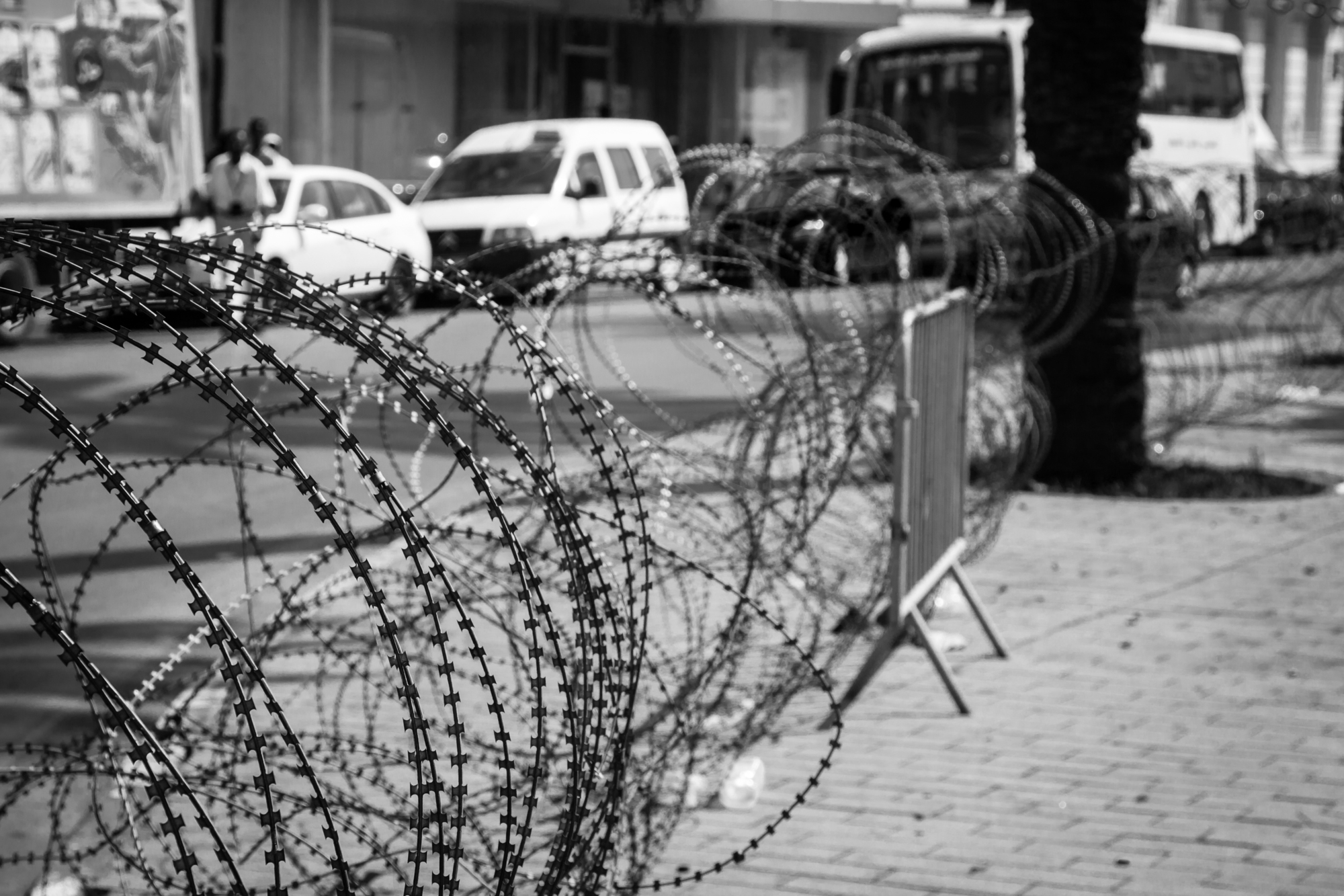 Barbed wire on the streets of capital on Tunis city. Image via Shutterstock/ By Lukasz Janyst