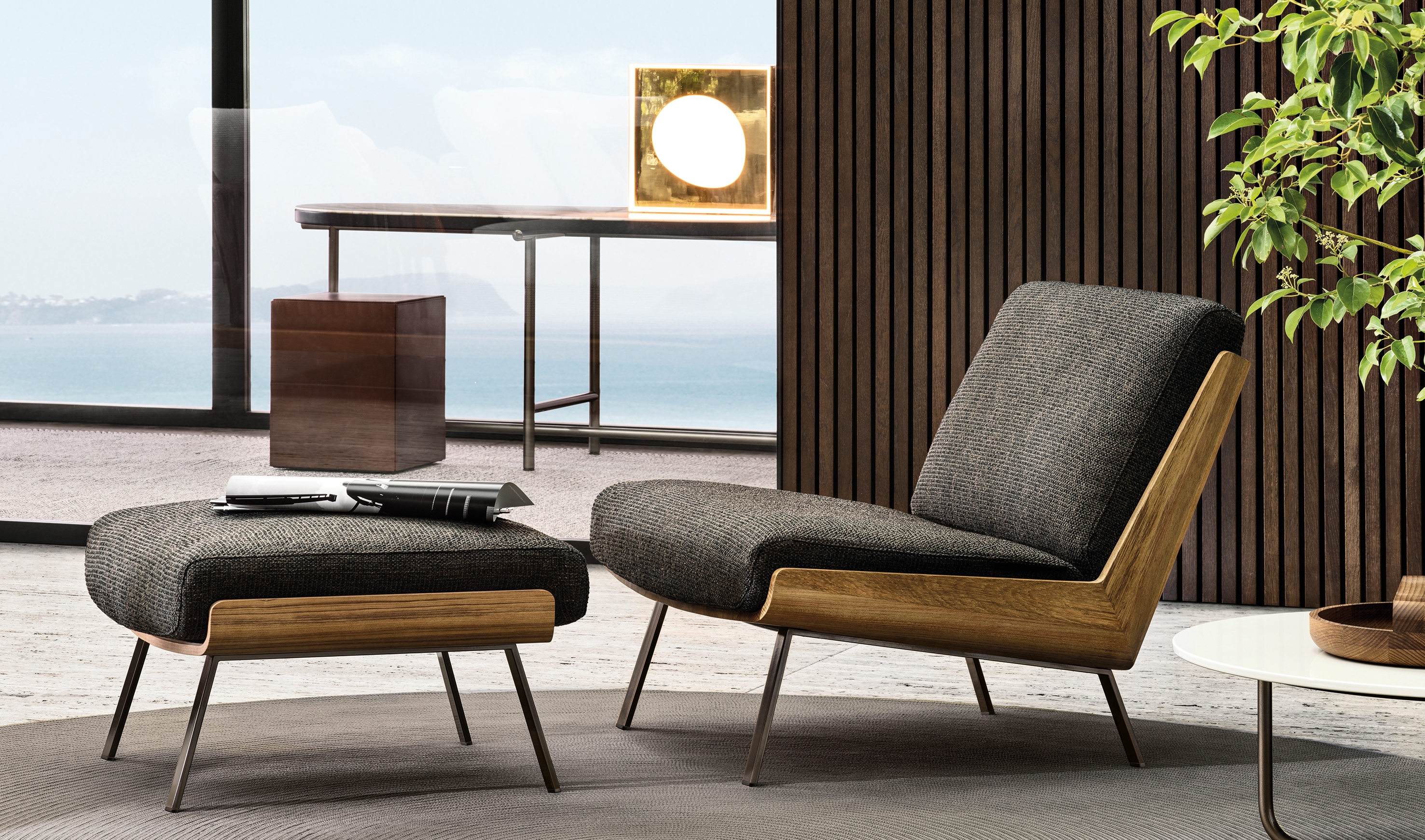 Marcio Kogan’s outdoor Daiki armchair comes with a comfortable footstool