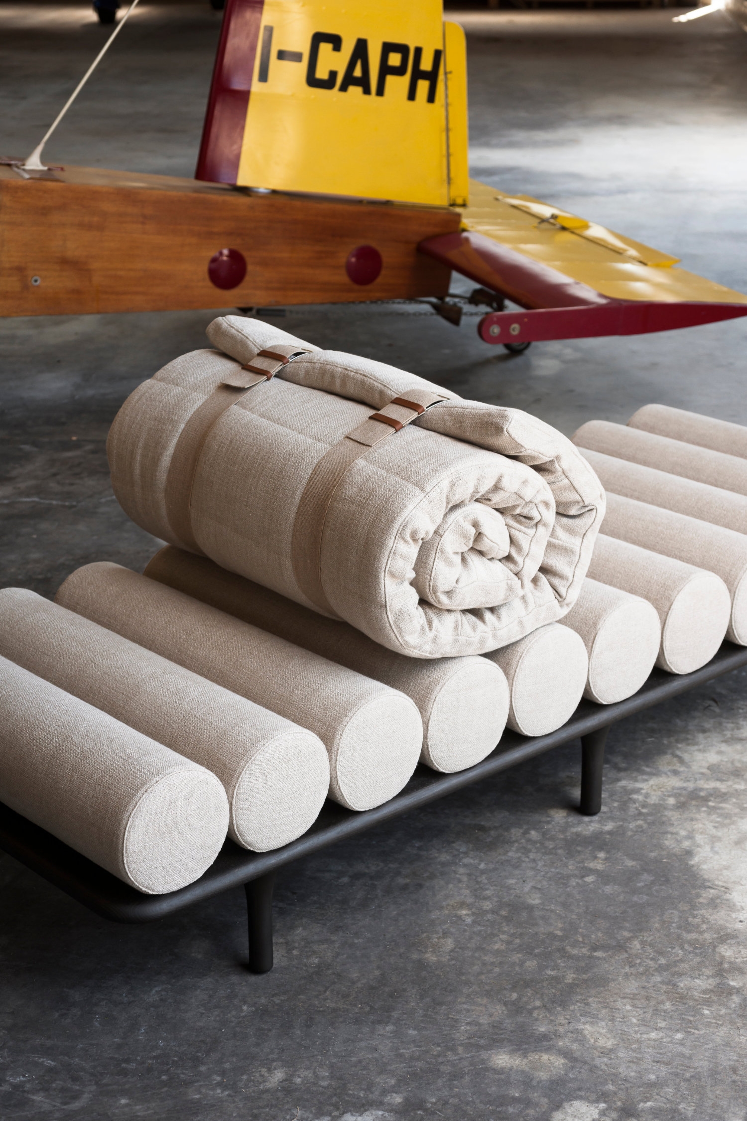 The Five to Nine daybed by Studiopepe is timeless in its sculptural form, and made multi-functional by virtue of a linen-upholstered topper mattress that transforms the piece into a guest bed