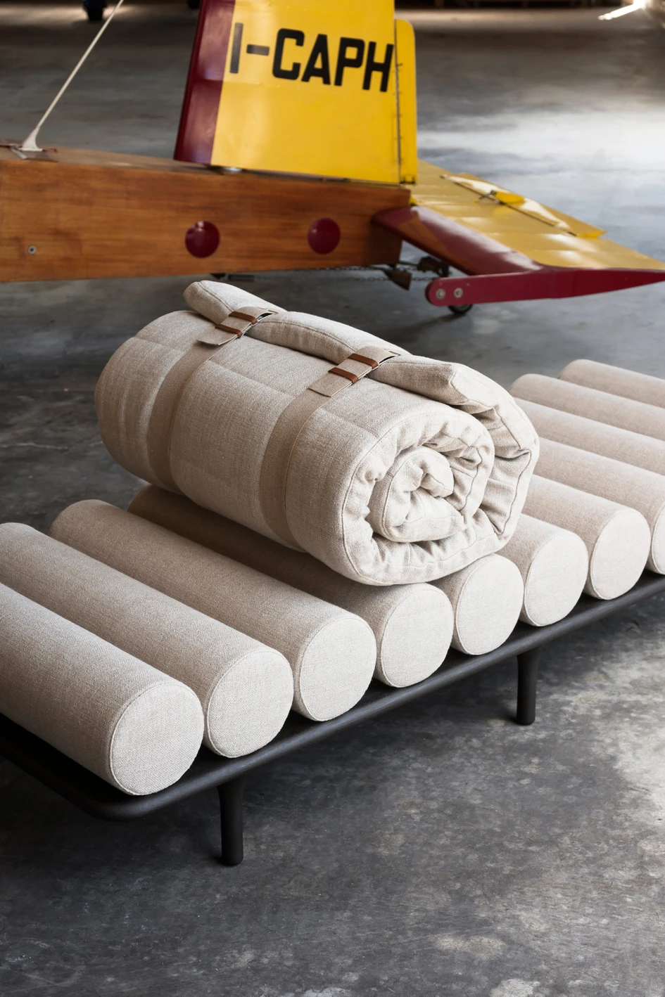 The Five to Nine daybed by Studiopepe is timeless in its sculptural form, and made multi-functional by virtue of a linen-upholstered topper mattress that transforms the piece into a guest bed