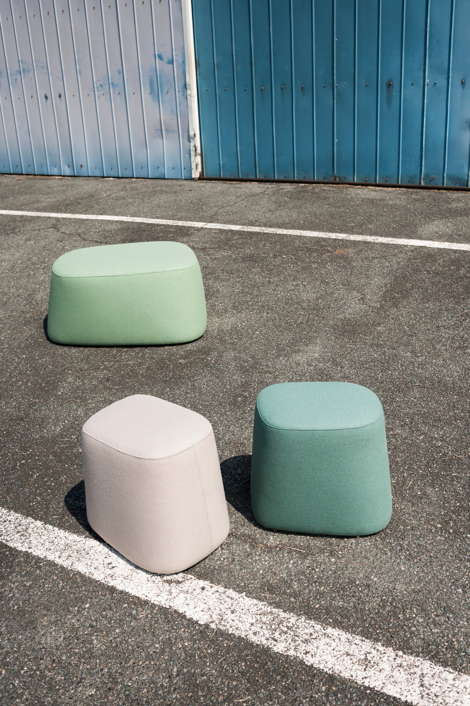 Float ottomans serve as both seats and footstools, and come in a number of sizes and finishes. A Roman travertine top on larger models adds coffee table to the possible functions the piece can fulfil