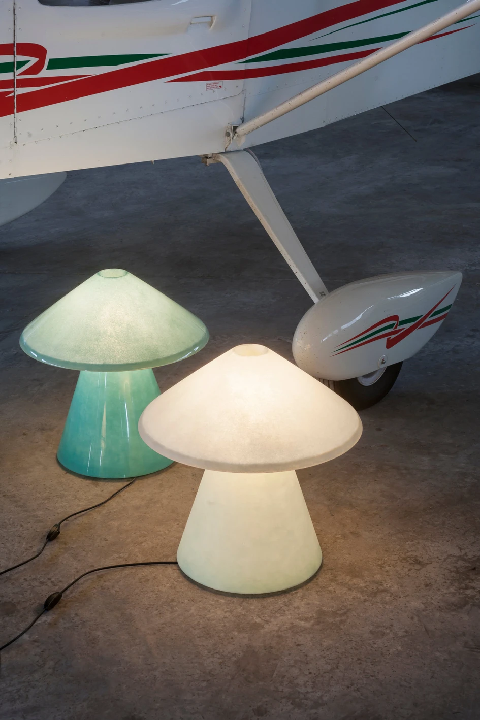 Umberto Riva’s A.D.A. Lamp, named for the way the shape of the letters mimic the piece’s archetypal design, is made up of two conical shapes in tinted fibreglass, fused together and lit from within