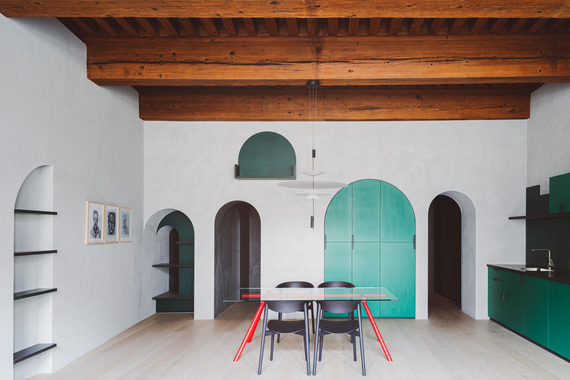 The colour blocking scheme in studio razavi architecture's Apartment XVII is used to accentuate kitchen cabinets and integrated storage space, creating an uncluttered and clean interior. Photos: Simone Bossi