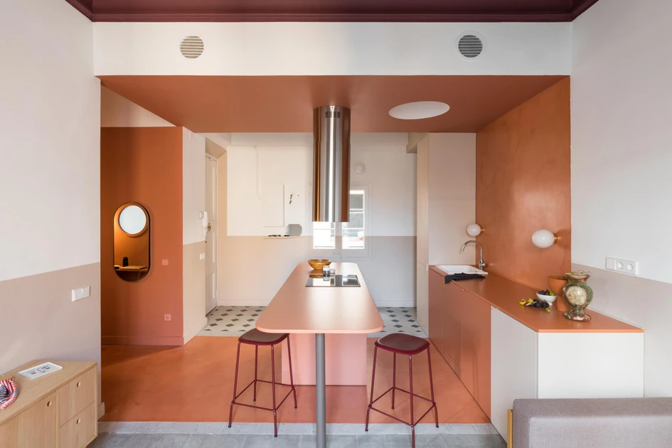 Striking colour blocking in the kitchen on CaSA – Colombo and Serboli Architecture's Klinker Apartment emphasises its role as the home's prime social space. Photos: Roberto Ruiz