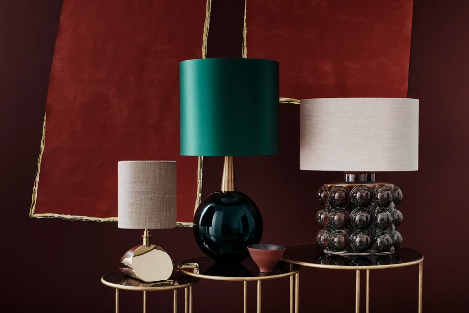 Top: Porta Romana’s Cocoon and Orb pendant lights above the Large Miro Centre table with a French brass base and dark fumed oak top. Above, from left to right: Sway, Bishop and Boublé lamps on the Lilypad nest of tables