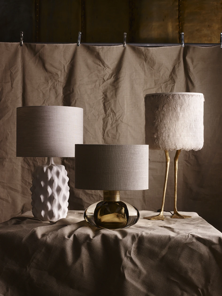 Top: Table lamps, from left to right: Cologne, Baobab, Small Cirque, Sculpted Manhattan, Miro, Duck Feet and Crystal Strata. Above: Baobab, Cologne and Duck Feet table lamps