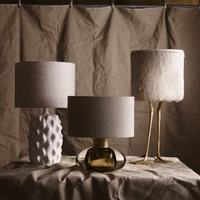 Top: Table lamps, from left to right: Cologne, Baobab, Small Cirque, Sculpted Manhattan, Miro, Duck Feet and Crystal Strata. Above: Baobab, Cologne and Duck Feet table lamps