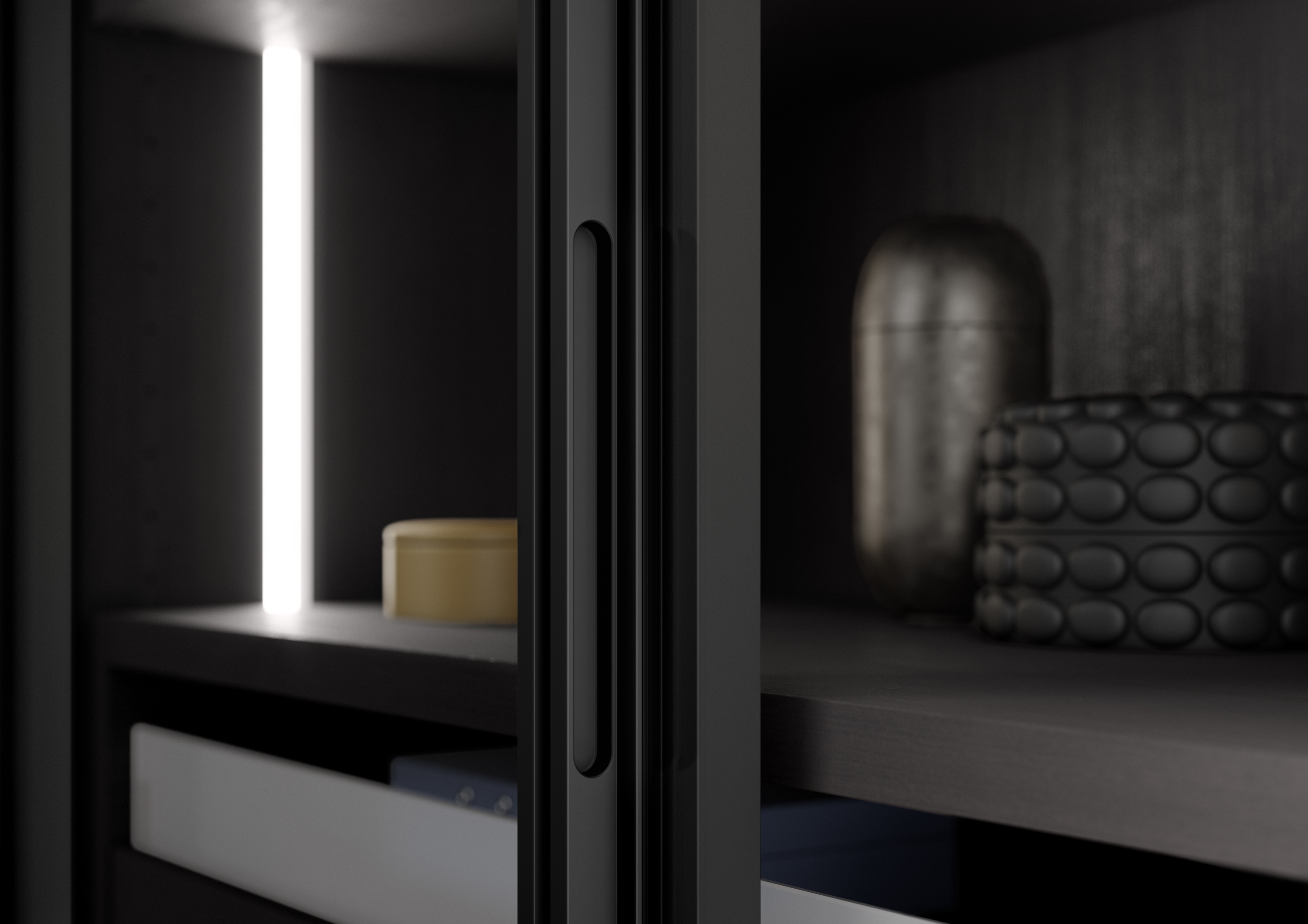 The revolving door, which is guided by two hinges on the top and bottom panel, is available with soft-close fittings (top) and optional handle profile (top) as standard