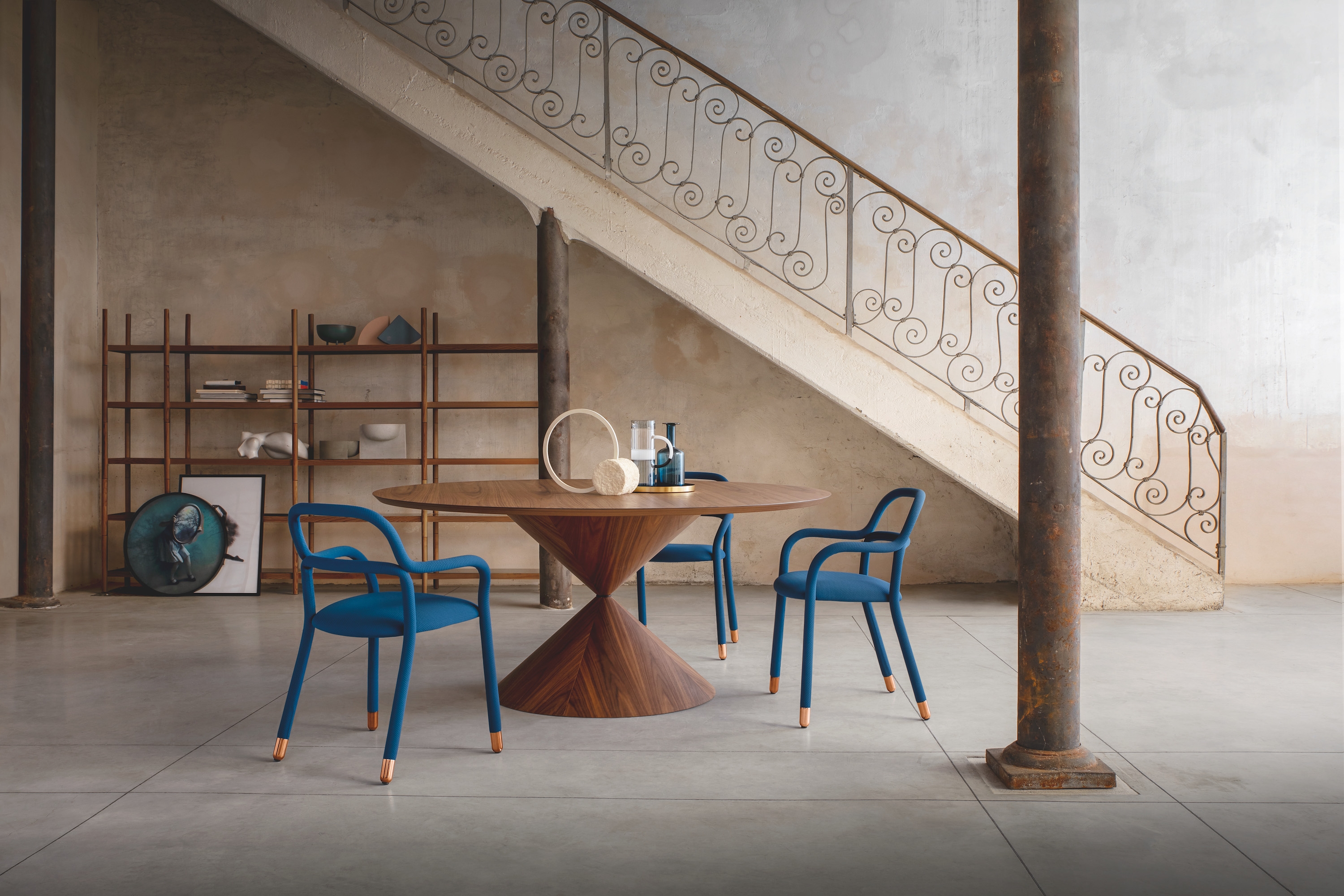 The award-winning Pippi chair is one of Midj’s most popular products. Both chair and armchair versions strut through spaces like a peacock, showing off a bright fabric- or leather-encased frame and shining steel socks