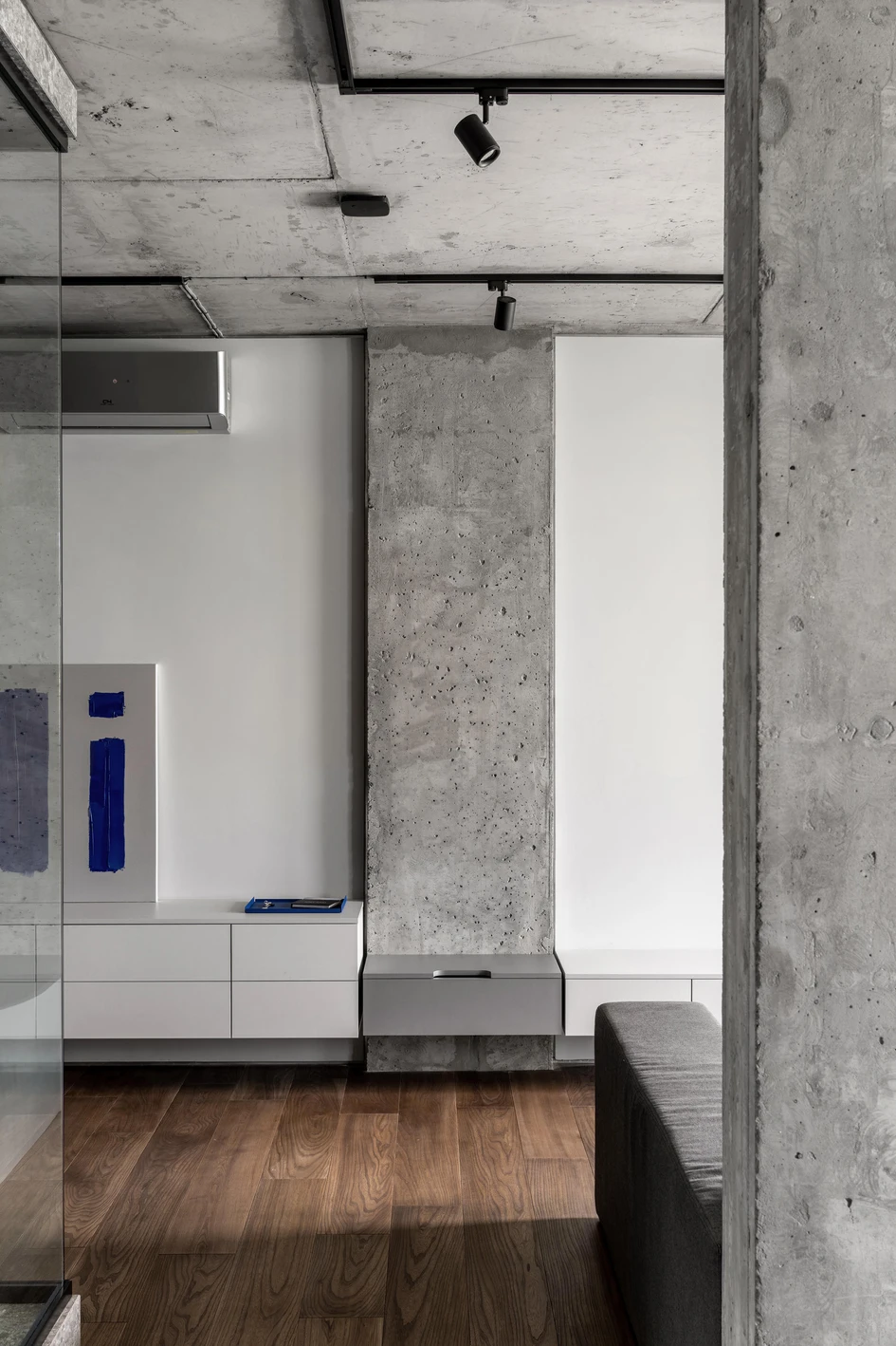 The residential Rybalsky Apartment by FILD Design Thinking Company features a compact, open-plan floor layout and minimalist decor. Photos: Andrey Bezuglov