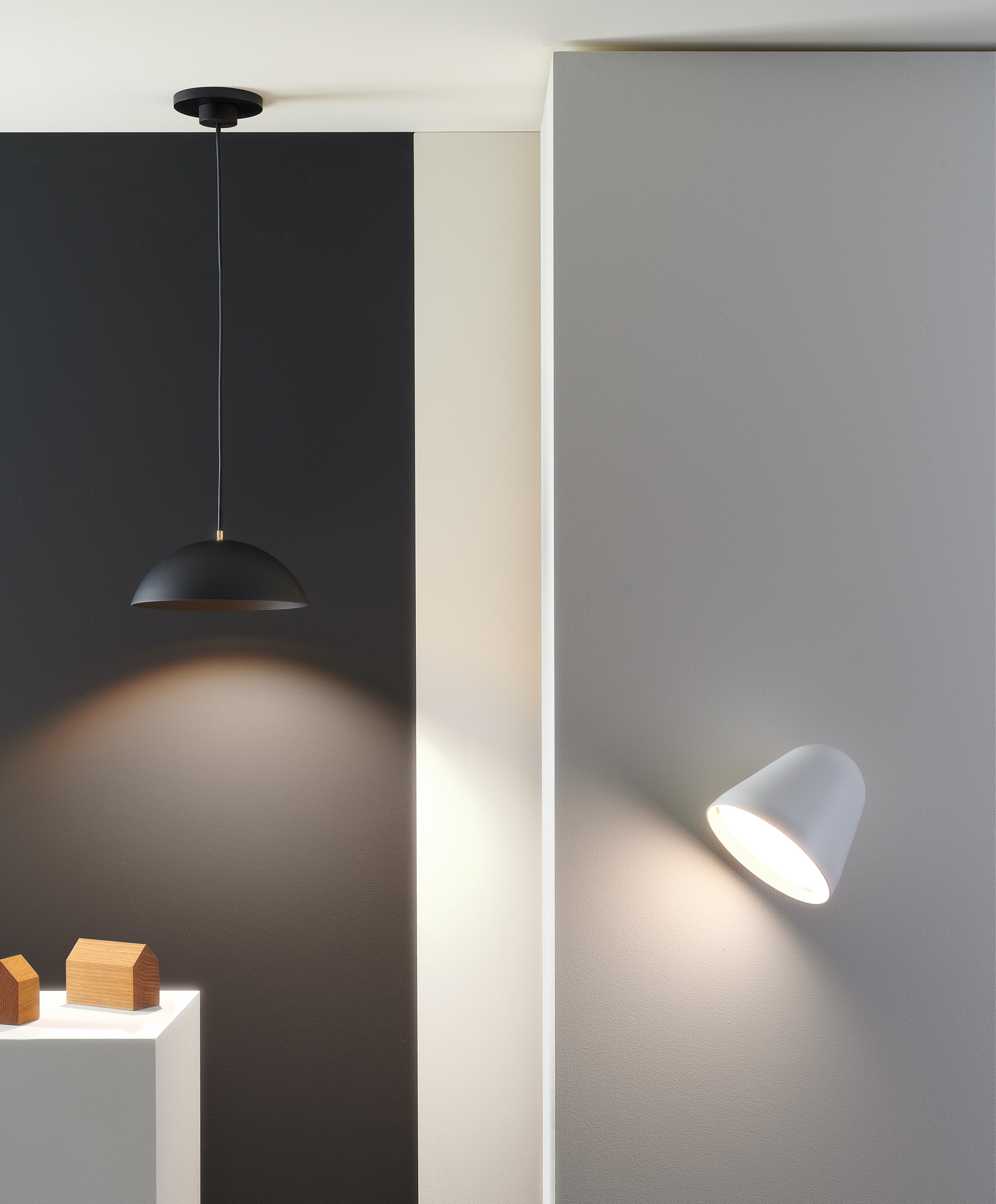 Above: The sculptural Liaison pendant luminaire by Axolight – for Plug & Light. Below: The Pong pendant luminaire and Tilt Wall wall luminaire from young lighting brand Nyta and which work with the Plug & Light system