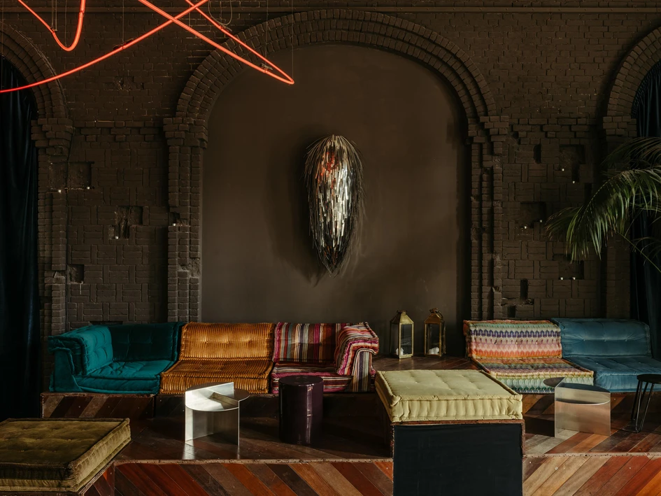 Generous and flexible, Oliver Mansaray and Daniel Scheppan's adaptive reuse project for the KINK Bar & Restaurant shows how post-industrial spaces can be redesigned to feel intimate. Photos: Robert Rieger