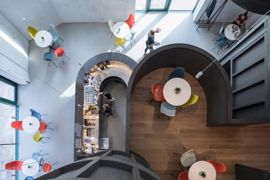 Chybik + Kristof Architects & Urban Designers' House of Wine bar and shop shows how architects approach adaptive reuse of spaces from very different eras within the same project. Photos: Laurian Ghinitoiu (top, above), Alex Shoots Buildings (centre)