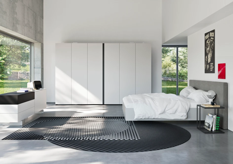 Clear lines: the B3 bed can be combined with the T3 bedside cabinet and a SOMA chest of drawers in blood orange (above). Or how about the FLAT wardrobe, B3 bed and SOMA chest of drawers (below)