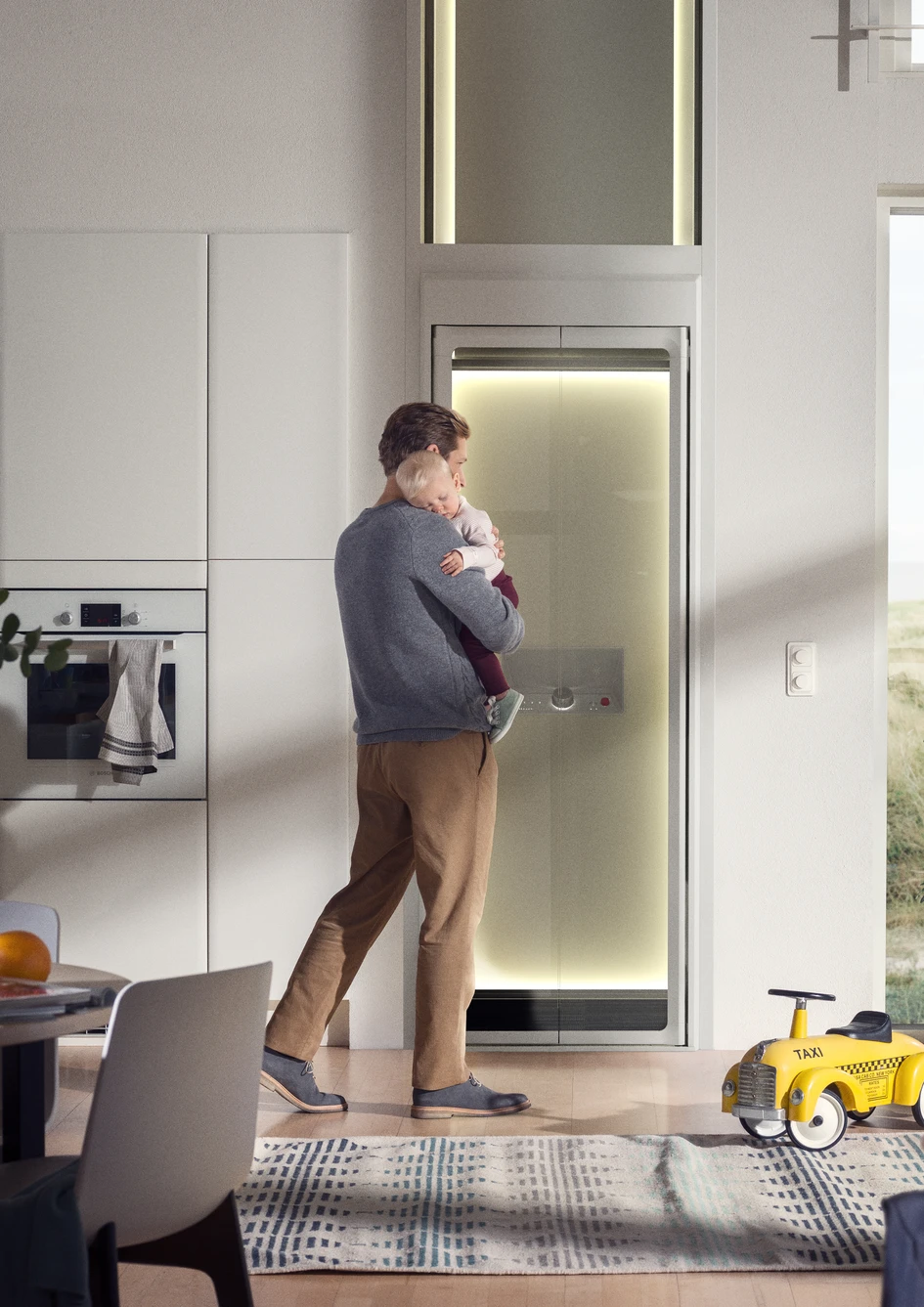 Carrying a sleeping child up to bed without having to face a toy-laden staircase is just one of Aritco HomeLift’s many hidden advantages – even for young, fit and healthy adults. Courtesy of Aritco. Photographer: Erik Undéhn