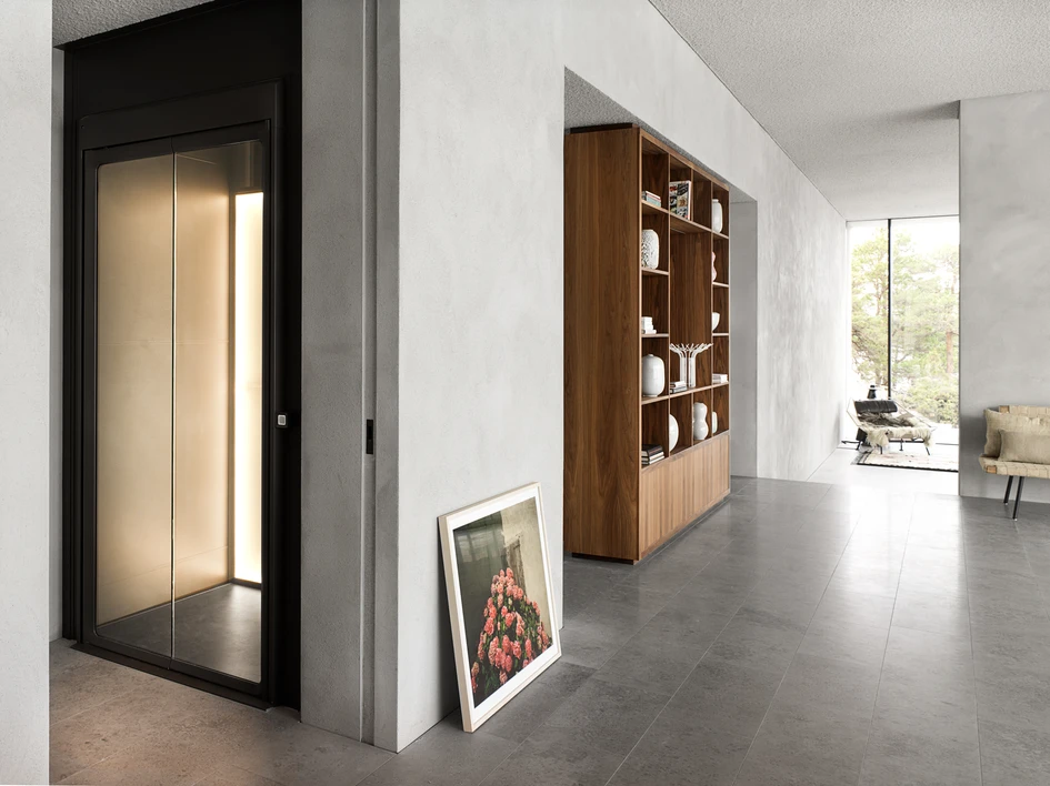 Historically industrial machines, lifts can seem out of place in the home, but HomeLift’s varied interior options make it as integral as a fitted kitchen or designer sofa. Courtesy of Aritco. Photographer: Erik Undéhn