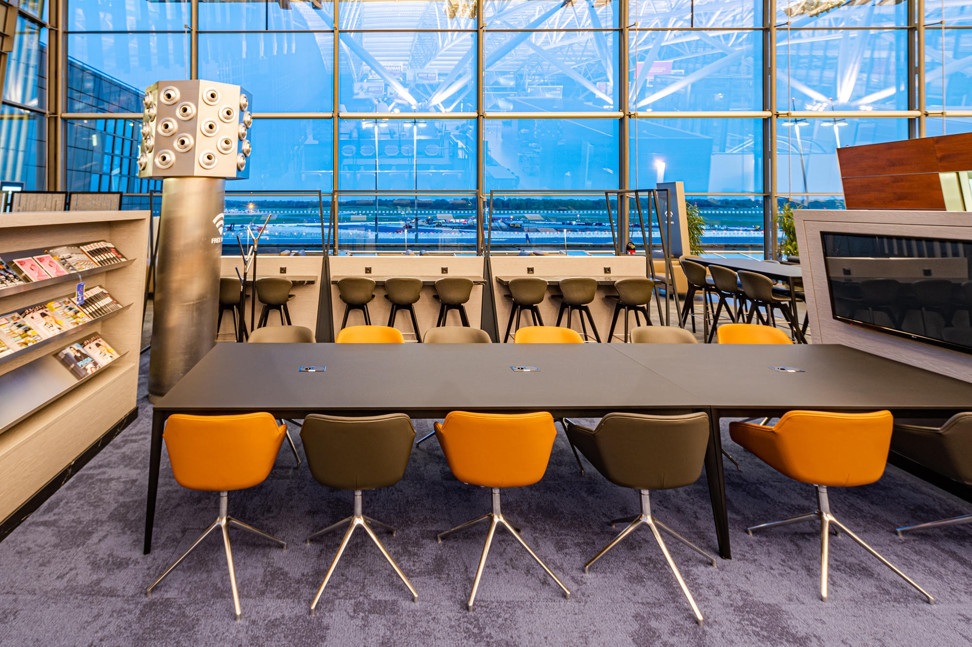 The design adapts to the unique quirks of the airport location, from making the best use of the abundant daylight, to curating the acoustics, so that the atmosphere is calm and inviting