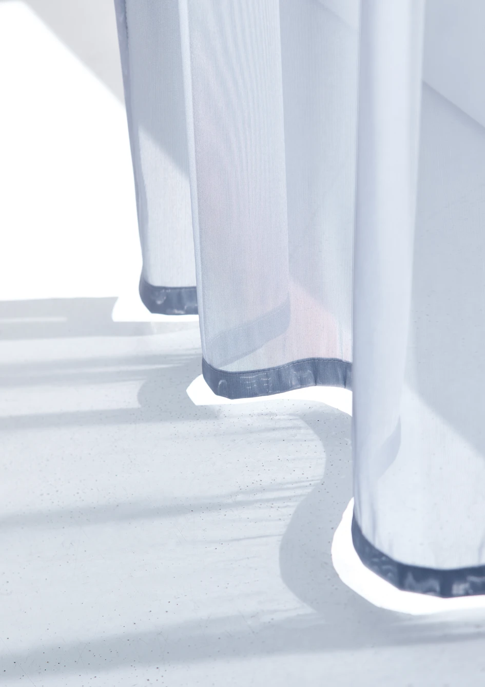 FACE combines a glossy white reflective exterior with a dark printed interior