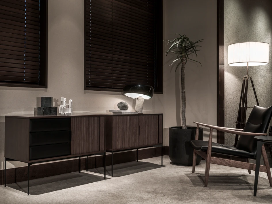 The Jabara sideboard and Rivage easy chair create a scene of calm formality
