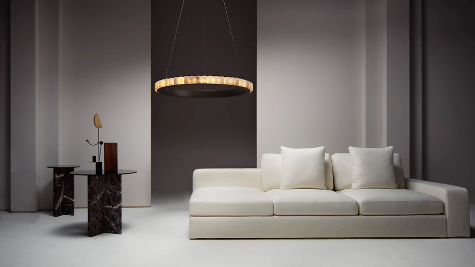 The translucent alabaster columns are arranged around a circular frame which comes in a choice of two different finishes: CTO Lighting’s signature smoky bronze or vibrant satin brass