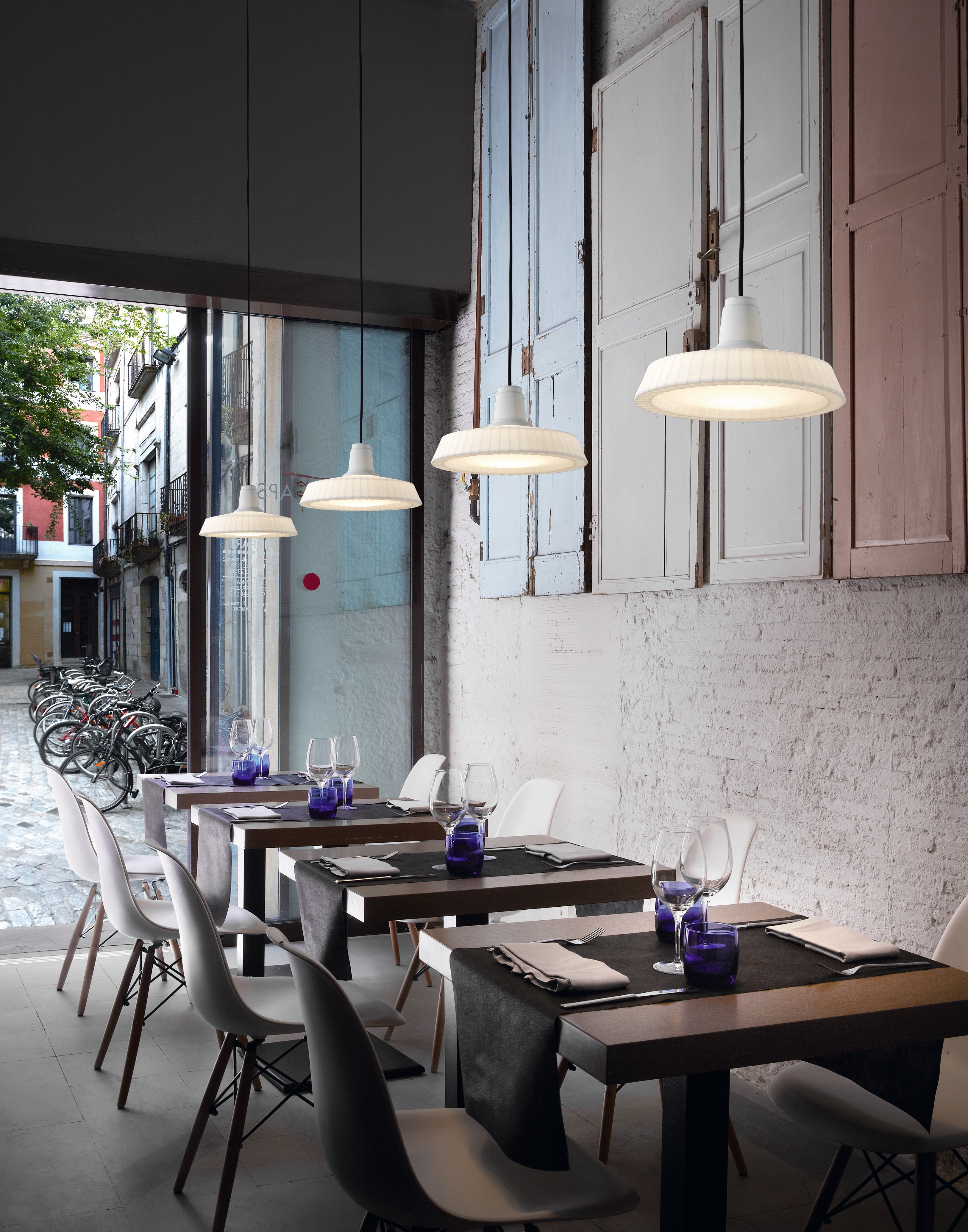 A perfect all-rounder for private terraces or busy restaurants, the Marietta Outdoor lamp, designed by Joana Bover, is based upon classic industrial factory lighting from the early 20th century