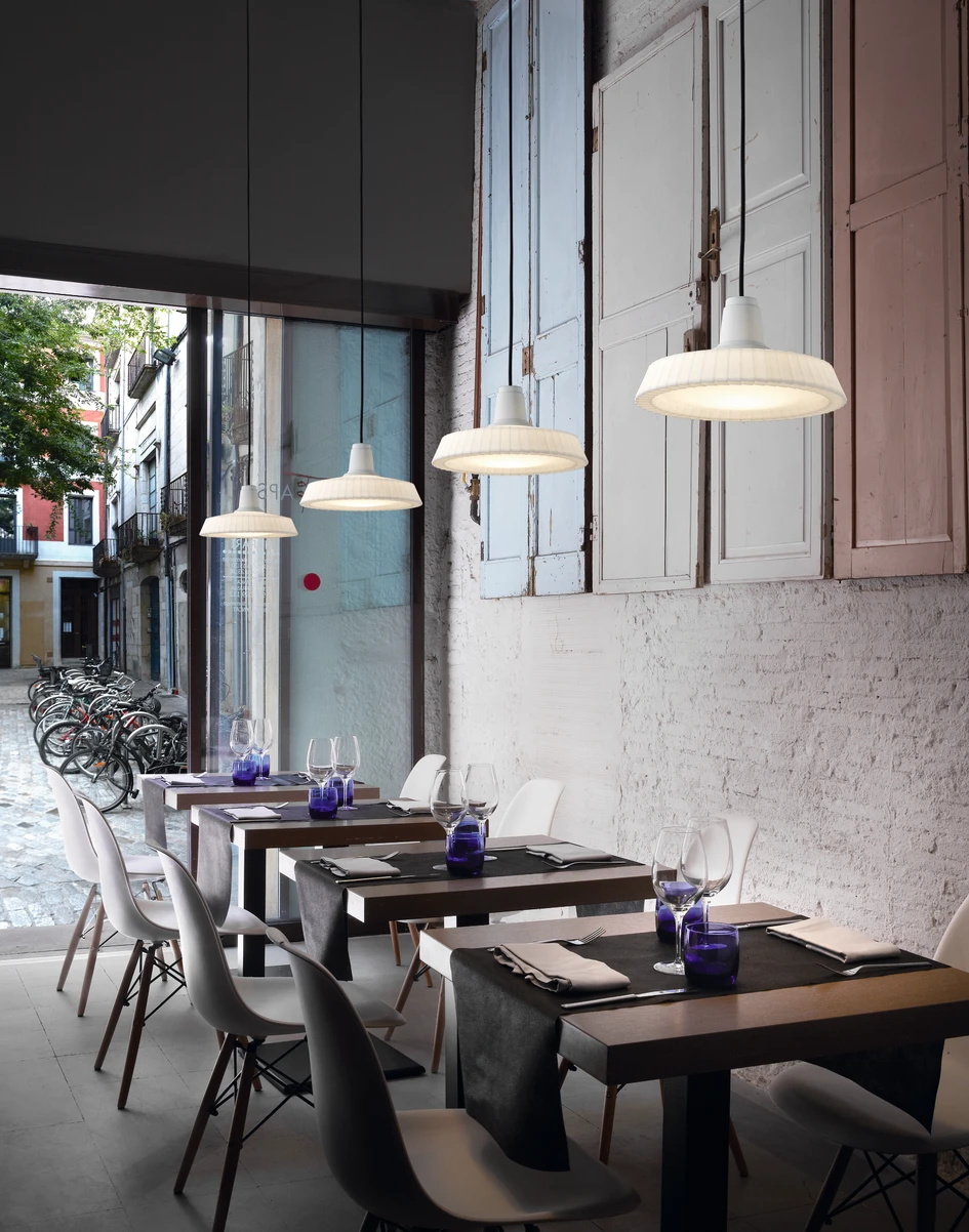 A perfect all-rounder for private terraces or busy restaurants, the Marietta Outdoor lamp, designed by Joana Bover, is based upon classic industrial factory lighting from the early 20th century