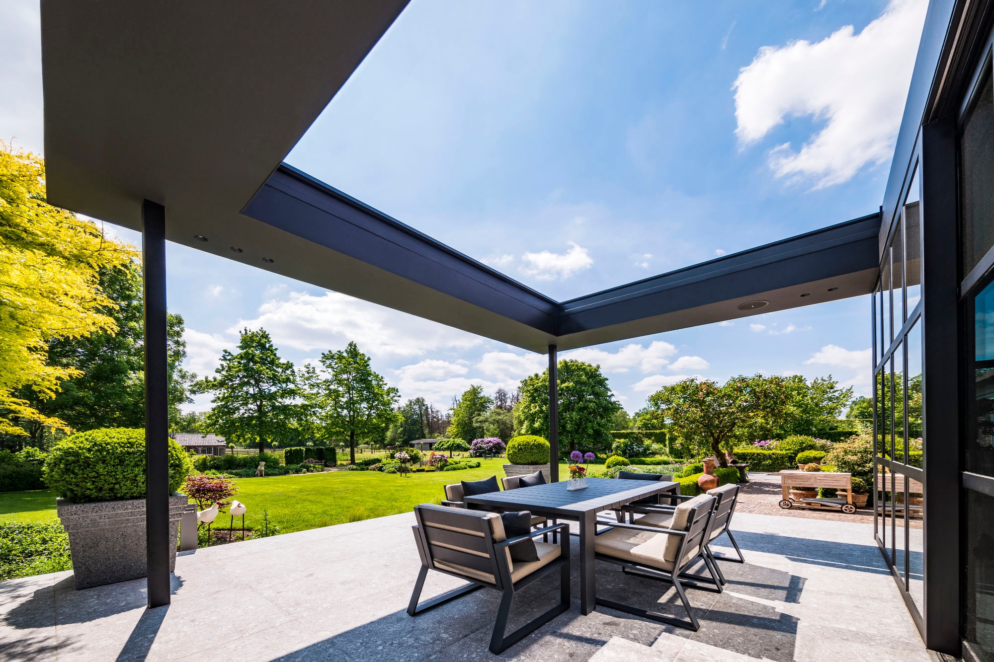 Offering infinite customisation, the cover has optional side elements to further shape outdoor space, as well as additional functions for comfort such as heating