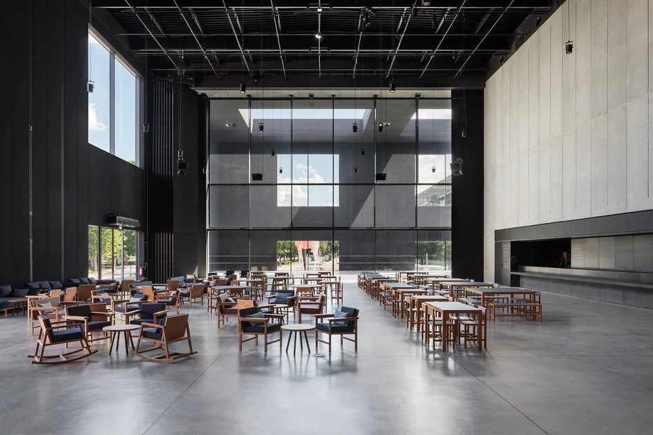 Out the door: Thanks to the foldable panels from Solarlux, the foyer and inner courtyard can be connected  