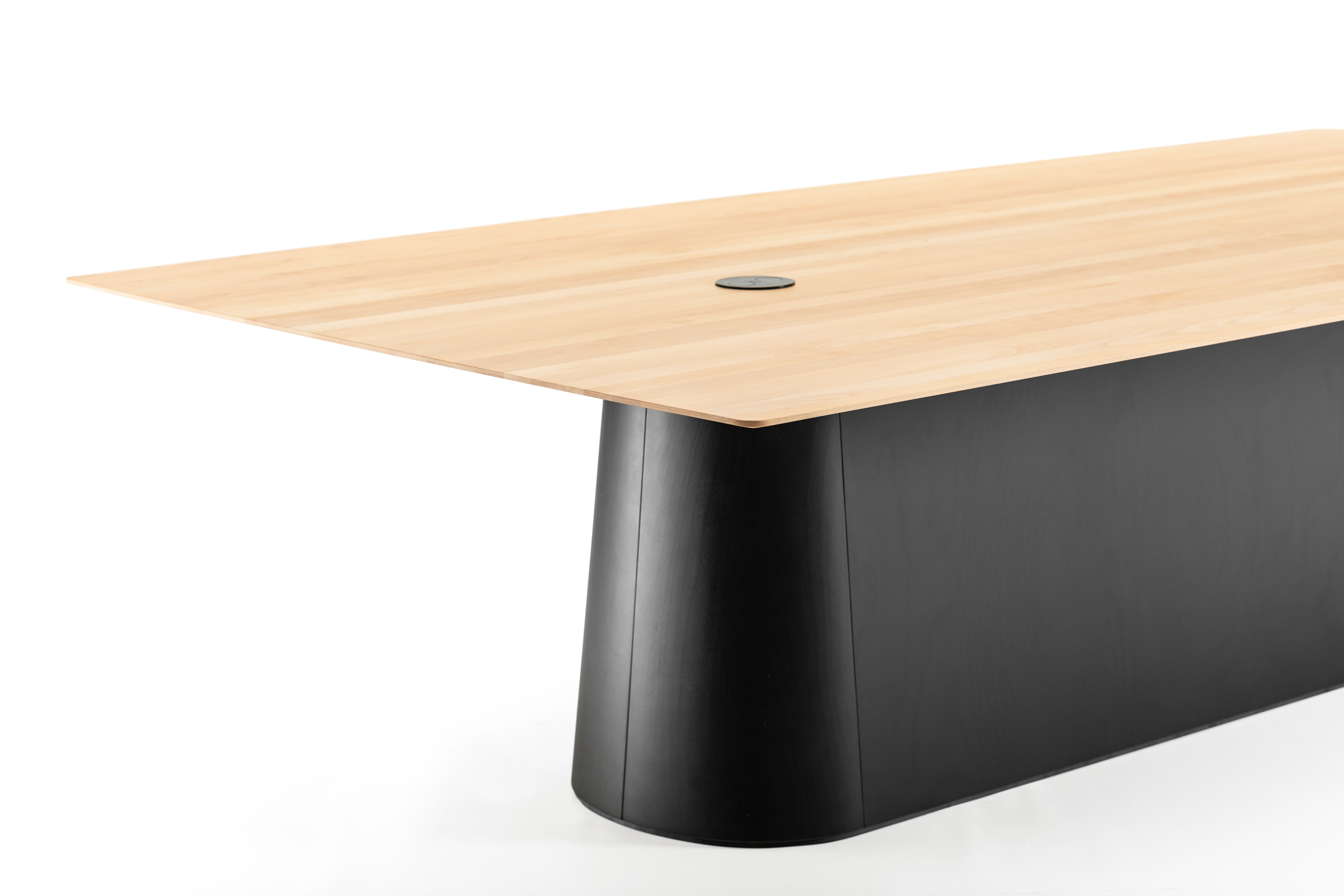 Versatility also comes in the choice of materials and finishes that can be worked into the design, from solid wood to veneer, lacquered or stained, uniform across the piece or with contrast built-in