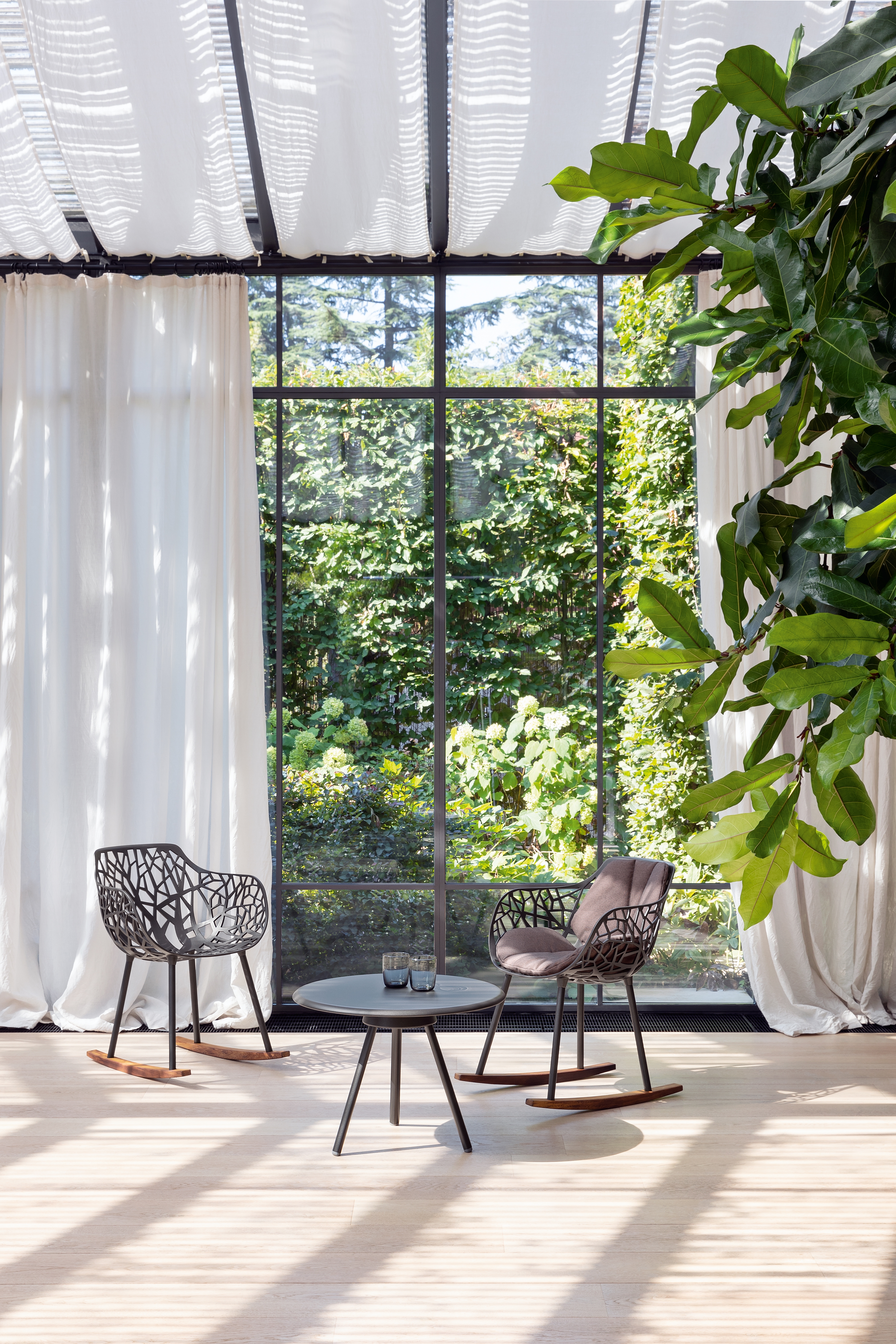 Cutting a fine figure indoors and out: Forest is also available with matching upholstery and in a rocking chair version with wooden sleds