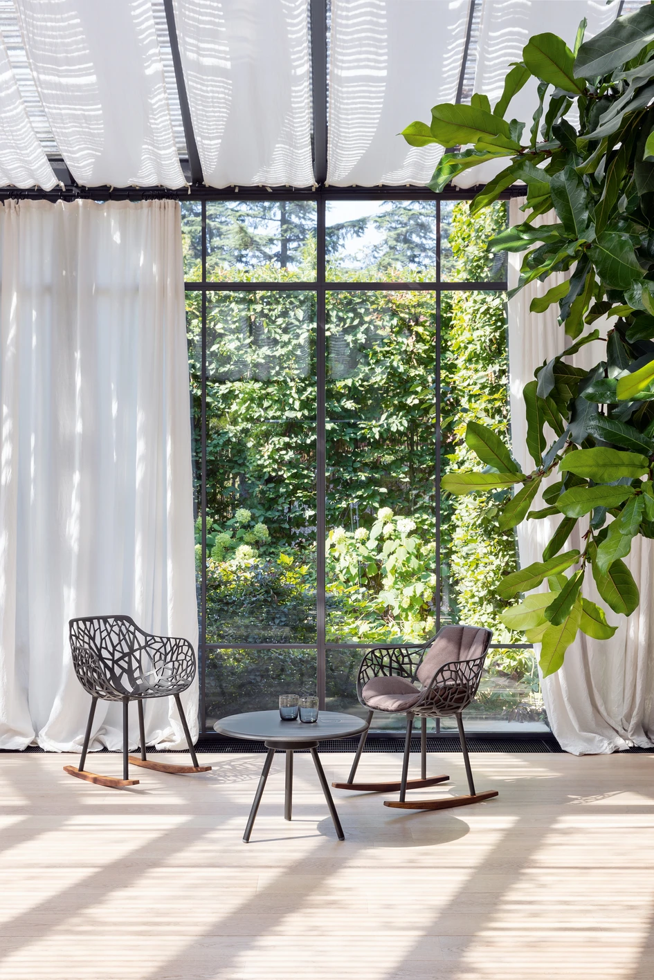 Cutting a fine figure indoors and out: Forest is also available with matching upholstery and in a rocking chair version with wooden sleds