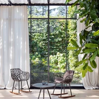 Cutting a fine figure indoors and out: Forest is also available with matching upholstery and in a rocking chair version with wooden sleds