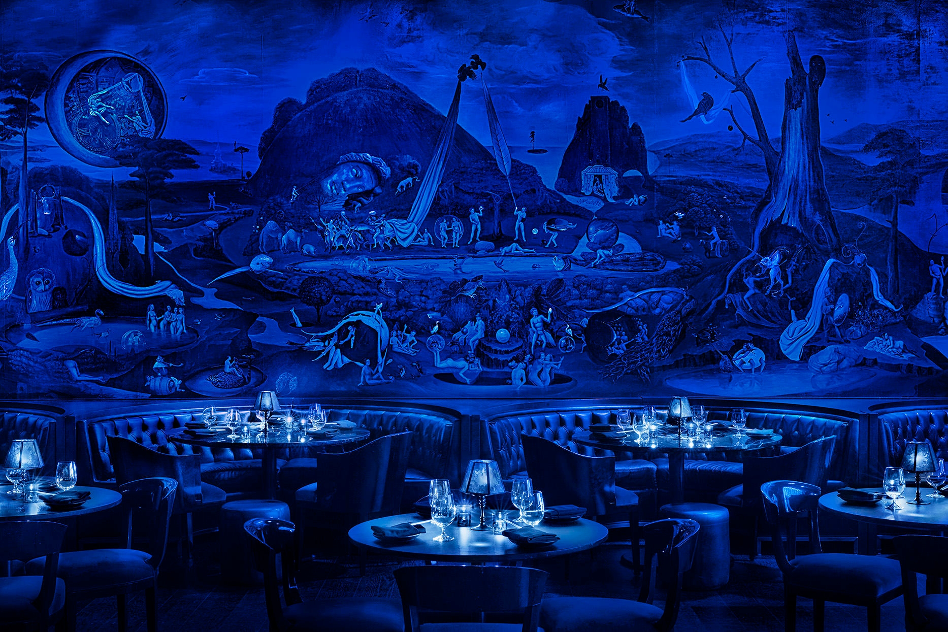 The deployment of the lighting scheme enhances the surrealist mural on the walls of FMS | Fisher Marantz Stone-designed Paradise Club. Photos: Nikolas Koenig