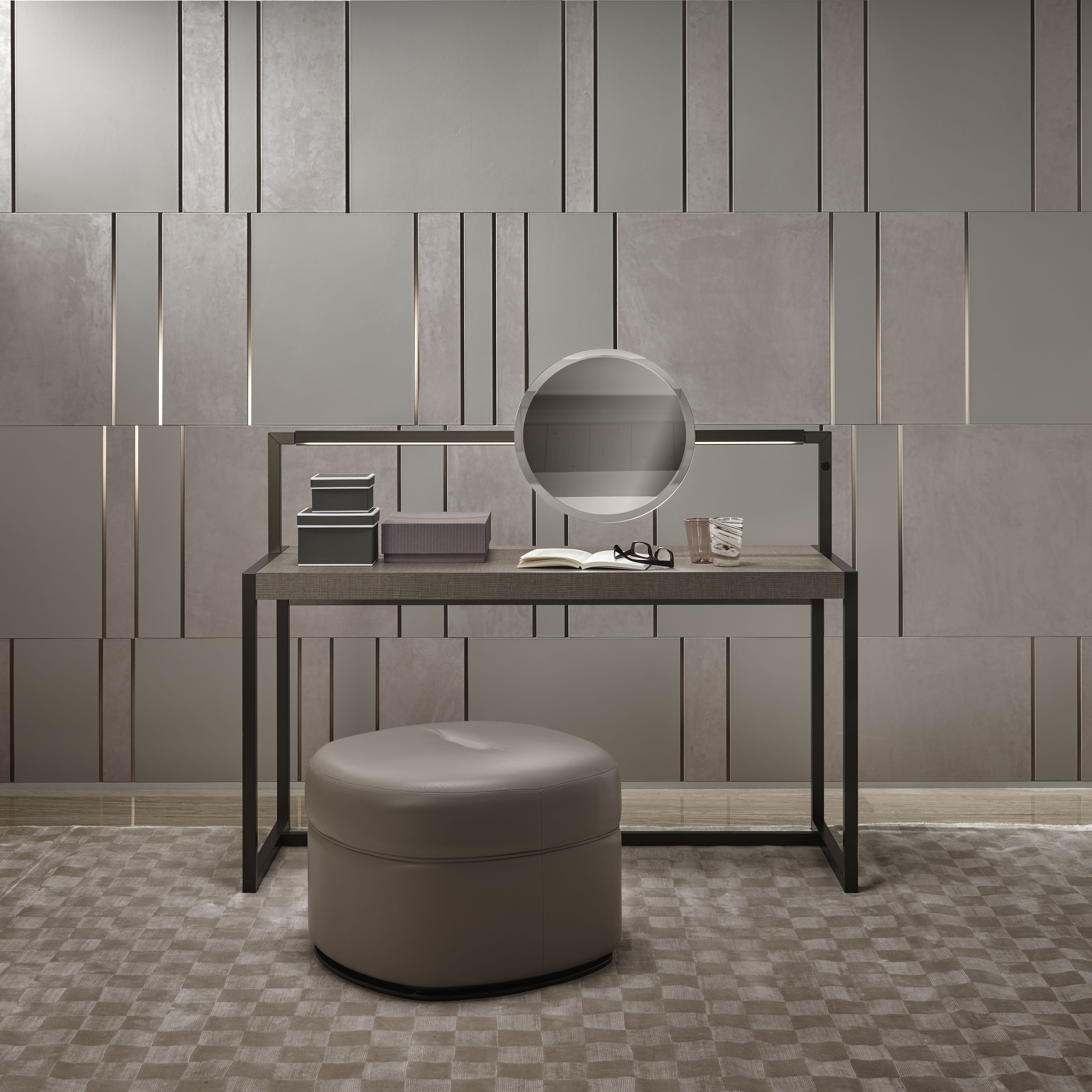 The Mosaico design (top) features small leather tiles with graduating shading patterns, while the Ryder design (bottom) recalls the dynamism of racing cars with varying textures and finished metal inserts